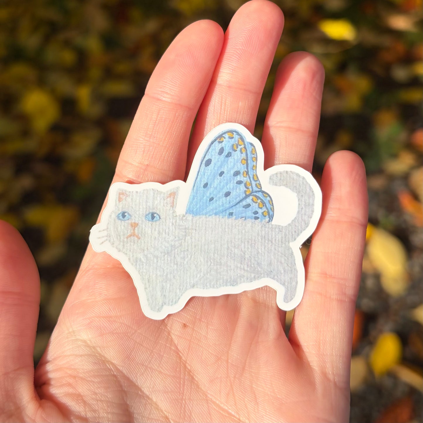 "White cat butterfly" sticker